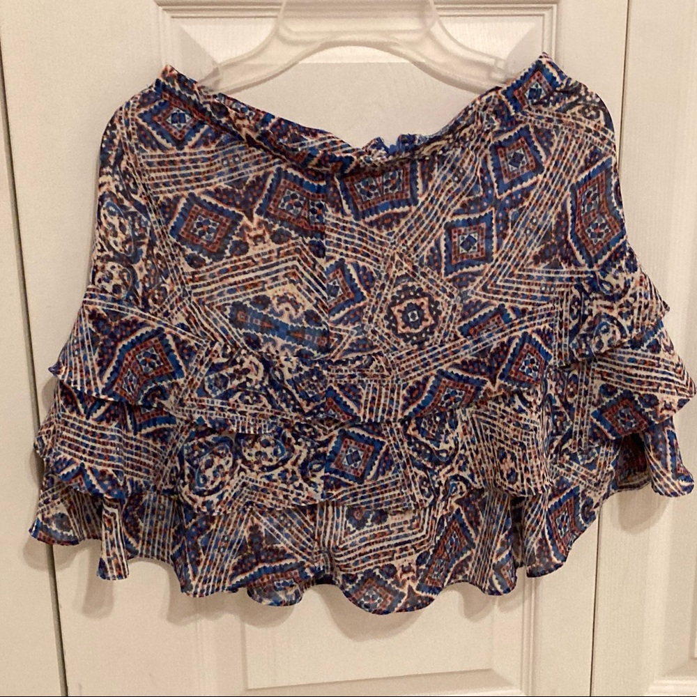 A Chiffon, brand new fully lined skirt without tag, for girls of size XS.
